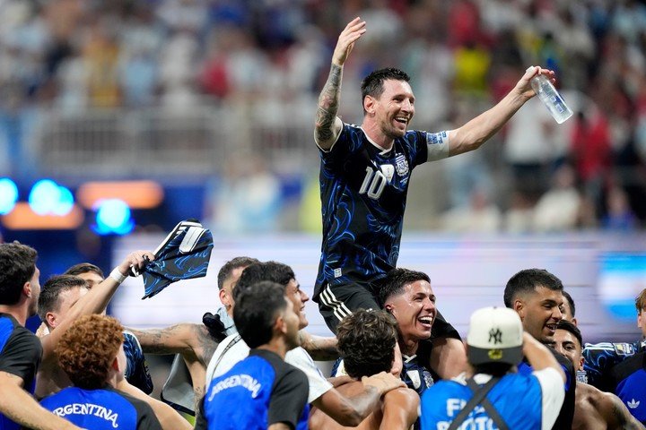 Argentina's Lionel Messi celebrates with his teammates at the end of the World Cup semifinal soccer match between England and Argentina in Atlanta (AP).